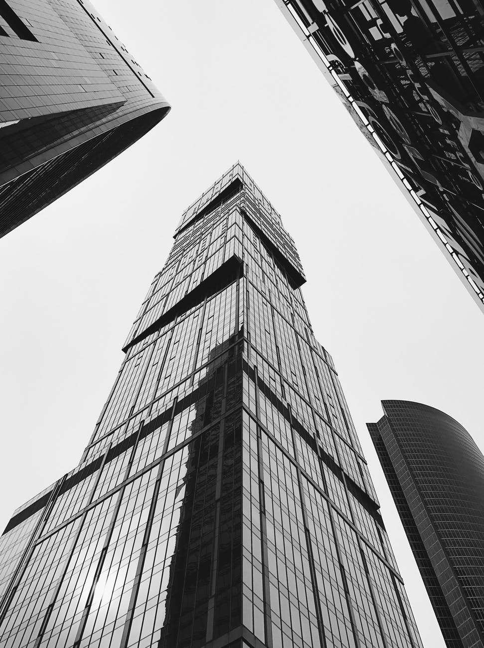 grayscale photo of a high rise building