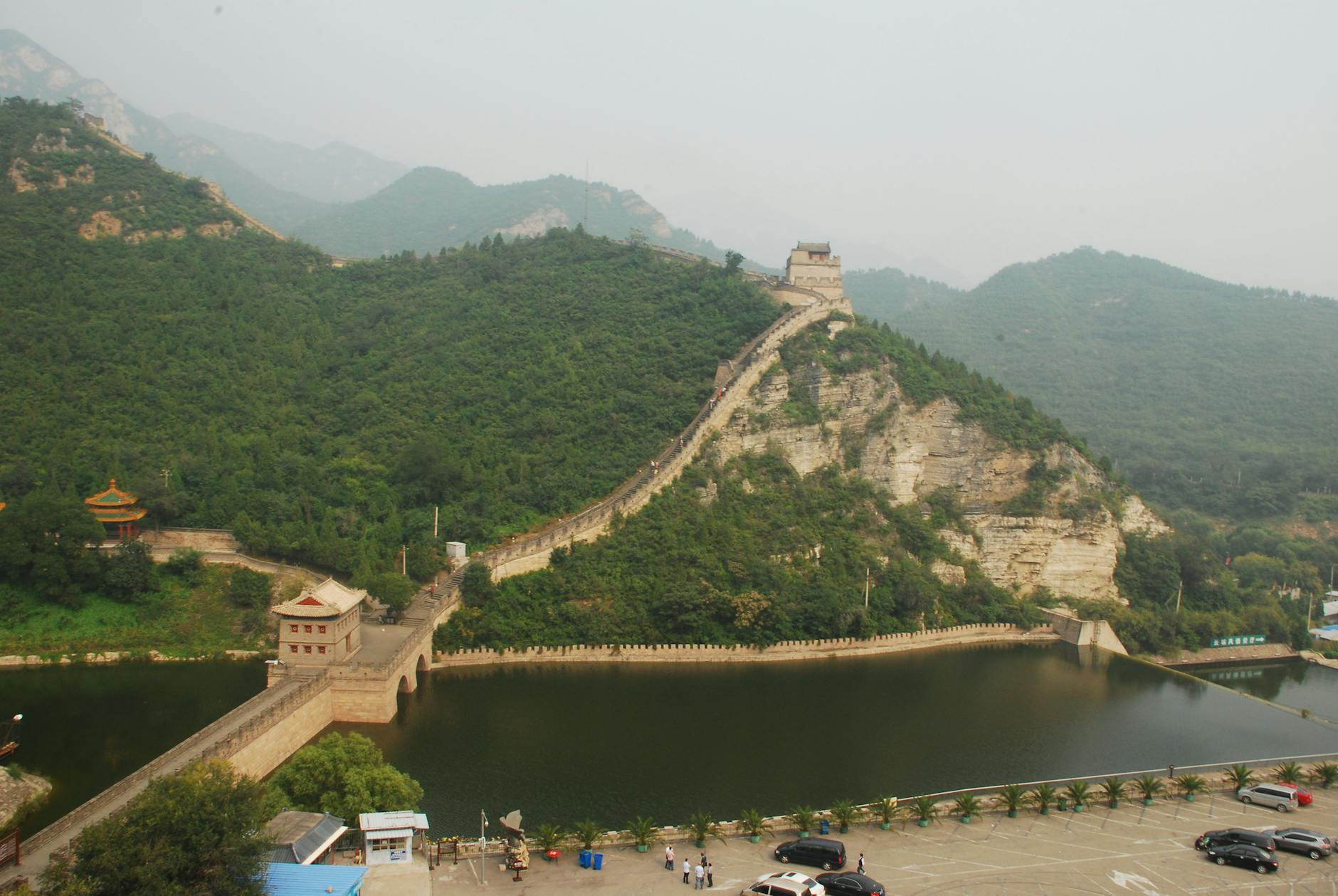 great wall of china winding through lush hillsides